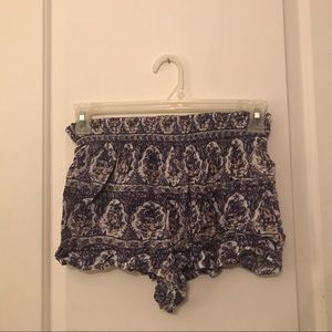 Out from under short floral shorts